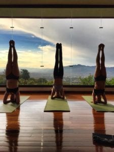 3 handstands in HIIT yoga session 