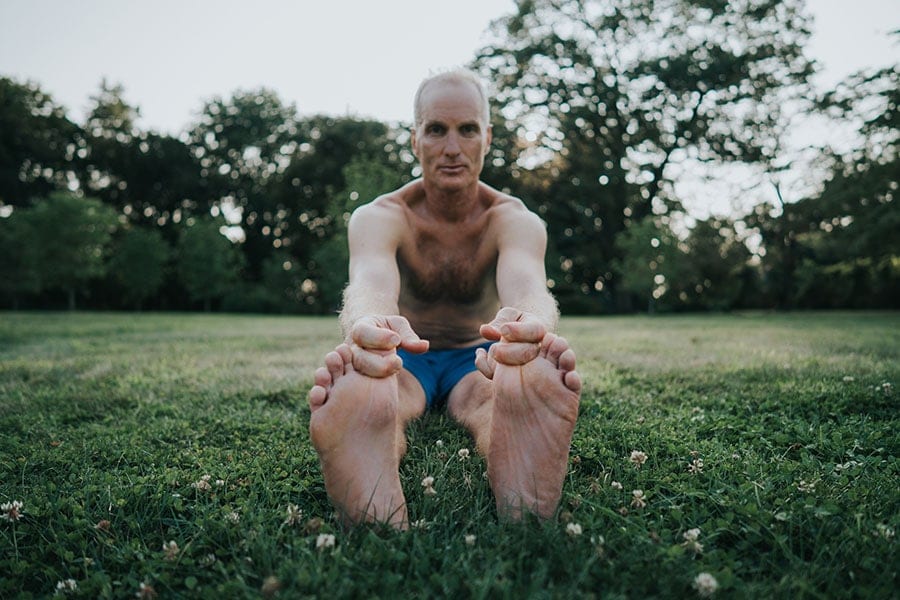 Bikram Yoga Instructor Dan Markowitz in Stretching Pose